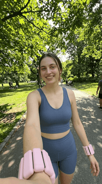 Nano_Banana_2_-_self_filmed_angle_pov_style_selfie_of_this_woman_walking_with_these_wristbands_on_sh_2